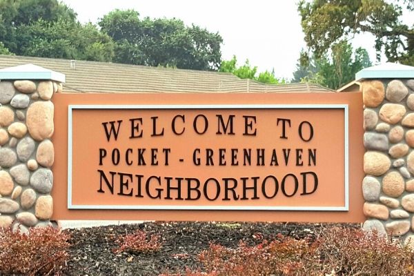 The welcome to Pocket-Greenhaven neighborhood sign.